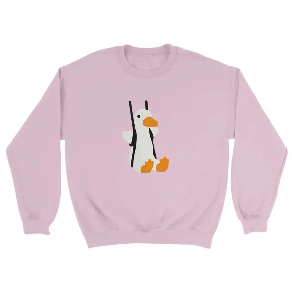 Pink cotton sweatshirt with a cute duck on a swing graphic, perfect for at home or playful casual wear for winter outfits.