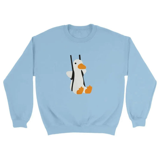 Light blue cotton sweatshirt with a cute duck on a swing graphic, perfect for at home or playful casual wear for winter outfits.