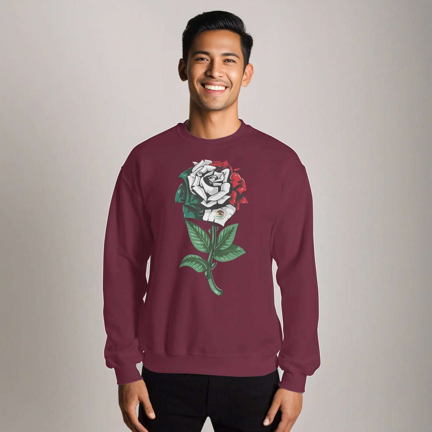 Maroon sweatshirt featuring a detailed rose with Mexican flag colors and emblem, symbolizing cultural pride.