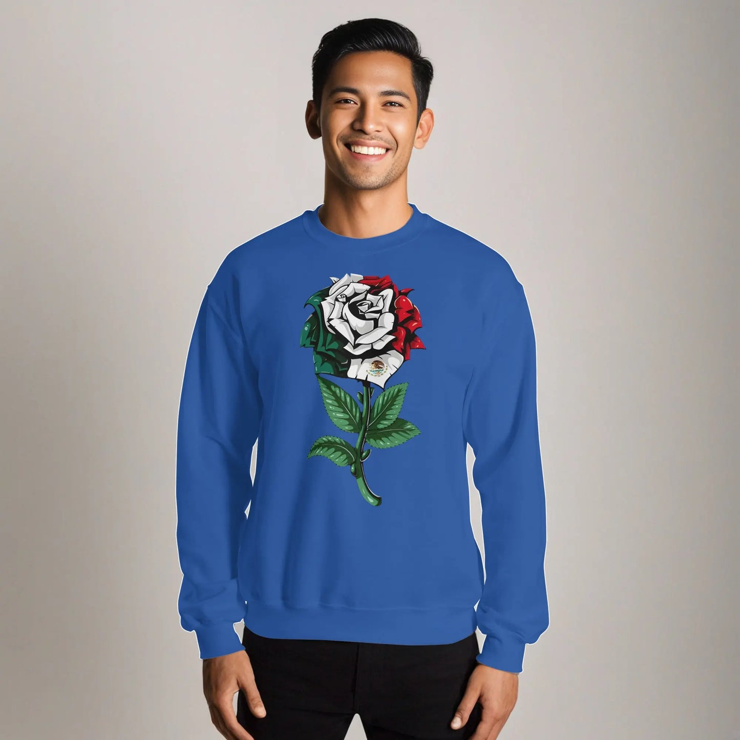 Blue sweatshirt featuring a detailed rose with Mexican flag colors and emblem, symbolizing cultural pride.